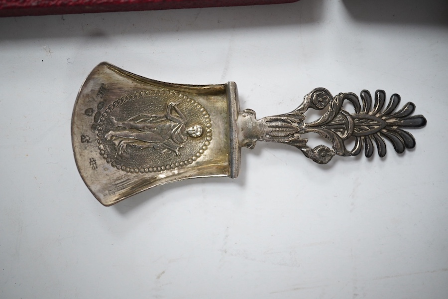 A cased Victorian engraved silver four piece christening set, by William Hutton & Sons Ltd, London, 1895, comprising a spoon, knife, fork and napkin ring, together with a cased set of six silver teaspoons, a cased pair o